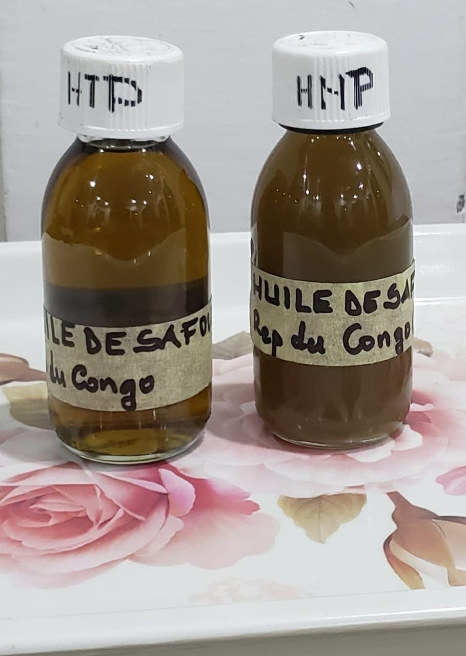 Two hand-labelled bottles of safou oil pressed on the estate, Republic of the Congo